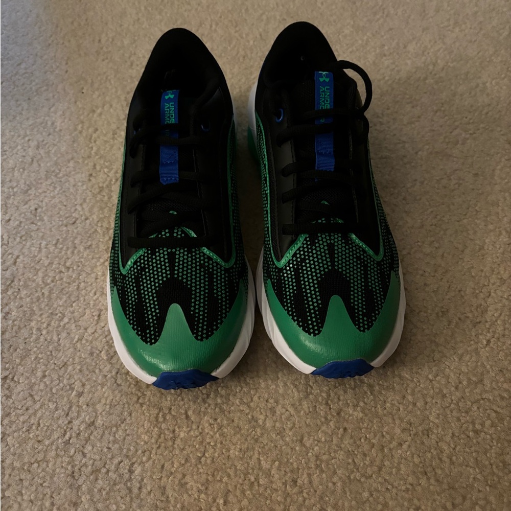 Brand new in the box boys size 7Y under armour sneakers.